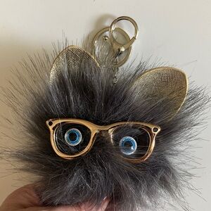 Source Unknown Gray and Gold Furry Keychain
